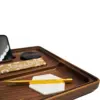 Detailaufnahme des vergoldeten Edelstahltools im Dab ’n Roll® XT Signature Set auf kleiner Silikonunterlage